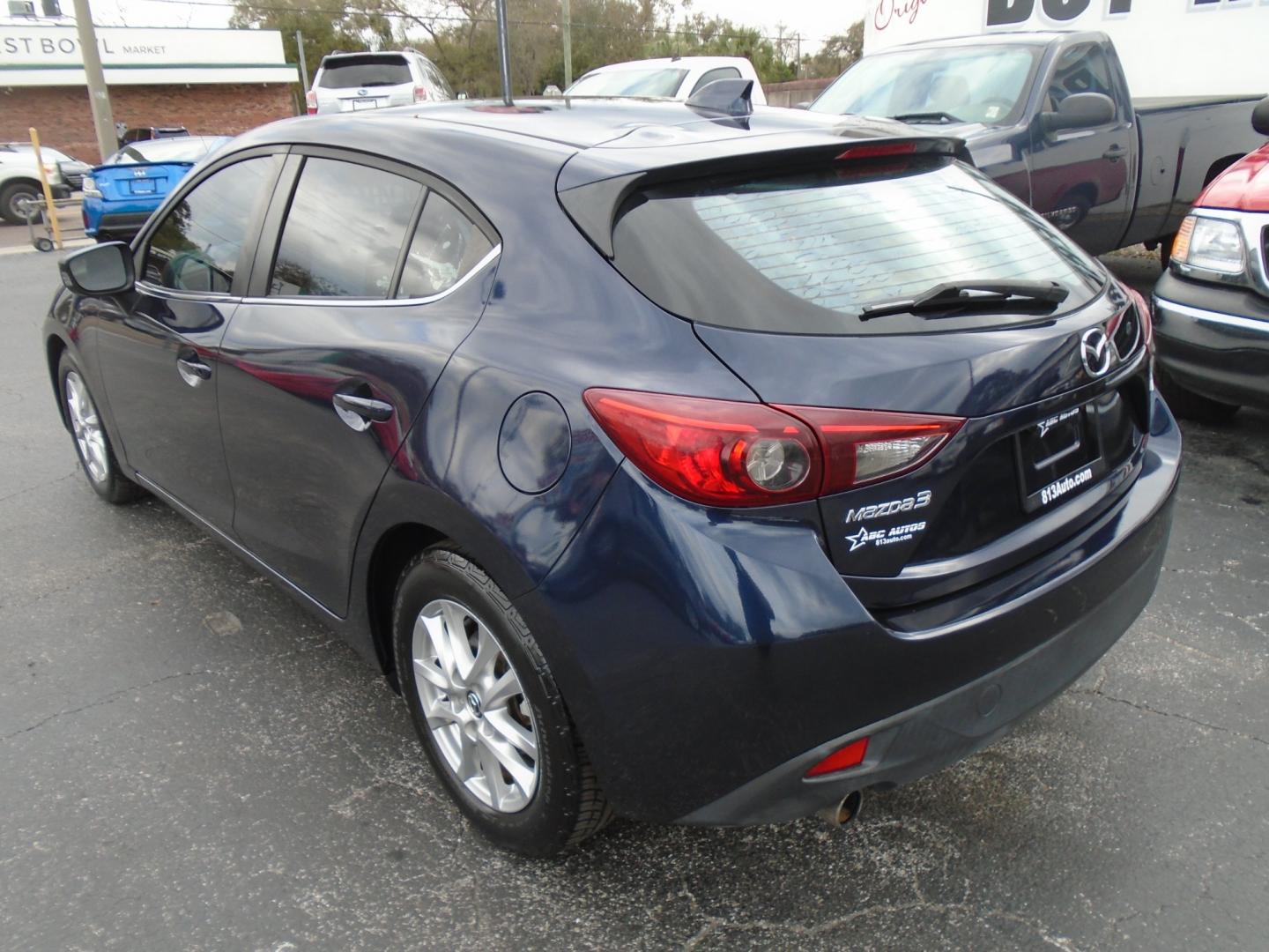 2014 Mazda MAZDA3 (JM1BM1M73E1) , located at 6112 N Florida Avenue, Tampa, FL, 33604, (888) 521-5131, 27.954929, -82.459534 - Photo#4